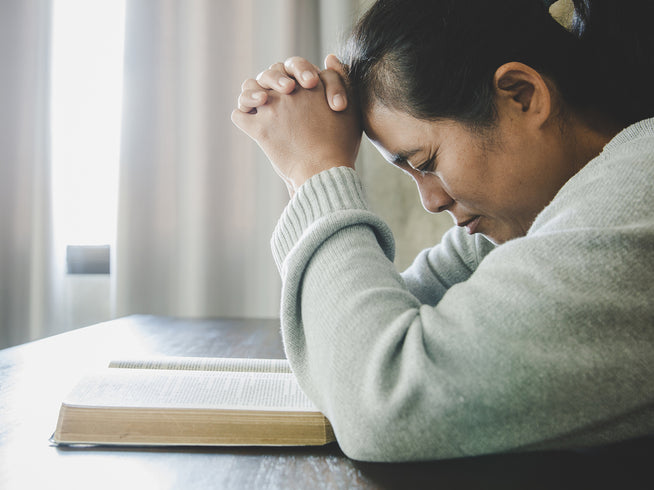 Woman in prayer