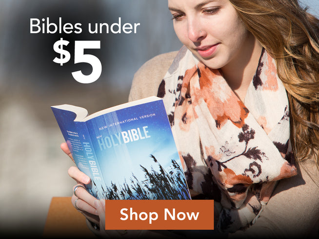 Woman reading a blue Bible with promotional text overlay - Bibles under $5 - Shop Now