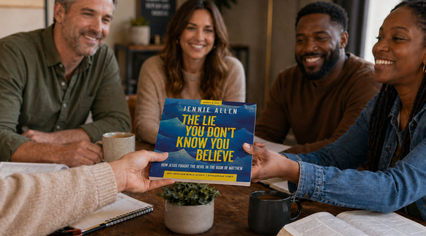 Group of people sitting together, holding a book titled 'The Lie You Don't Know You Believe' by Annie Allen.