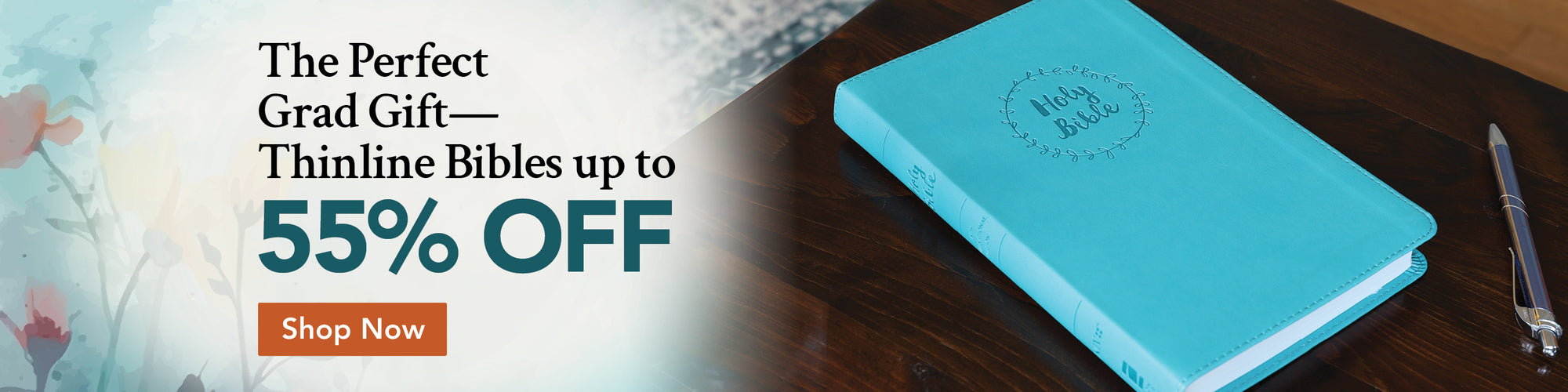 Teal Bible on a wooden surface with promotional text overlay. The Perfect Grad Gift - Thinline Bibles up to 55% off - Shop Now