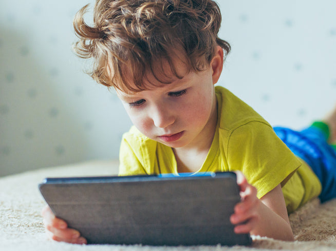 Small child holding and reading table device