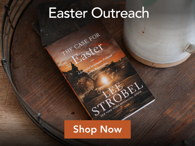 Book titled 'The Case for Easter' by Lee Strobel on a wooden surface with a mug and decorative elements.