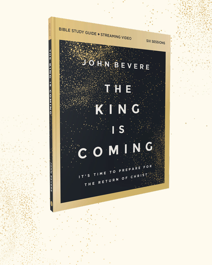 Bible study guide book titled 'The King Is Coming' by John Bevere, featuring a black cover with gold glitter texture and white text, set against a light cream background with subtle gold speckles.