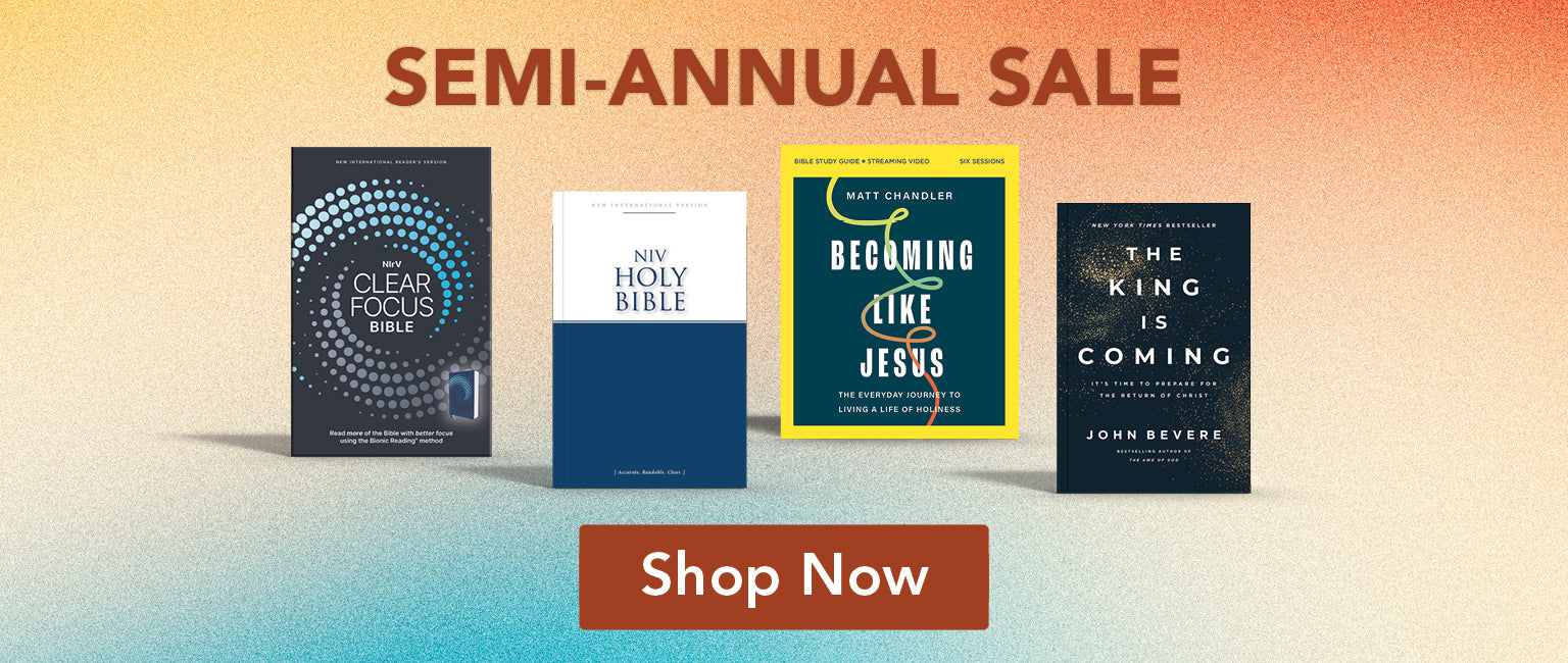 A promotional banner for a semi-annual sale featuring four different Bible books lined up against a warm gradient background. The books are titled 'Clear Focus Bible', 'Holy Bible', 'Becoming Like Jesus' by Matt Chandler, and 'The King Is Coming' by John Revere.