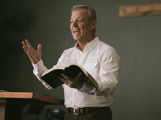 5 Things Your Church Can Learn from Theologians of the Past - Man Preaching from Bible